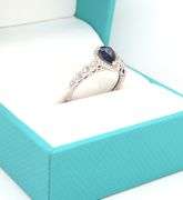 14kt White gold 0.90ct blue sapphire and diamond halo ring