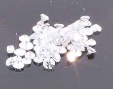 Bright white and full of fire! .86ct set of real Diamonds!