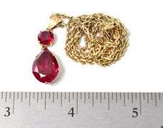 Brilliant Synthetic Ruby Pendant Necklace in 14K Yellow Gold