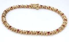14kt Yellow gold ruby and diamond tennis bracelet