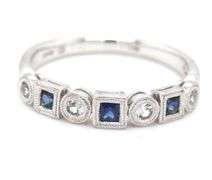 Contemporary 14K WG Blue & White Sapphire Band