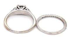 14kt White gold 0.25ct Center diamond in 0.50ctw diamond halo bridal set