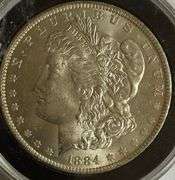 Frosty White BU 1884 O Morgan Dollar.