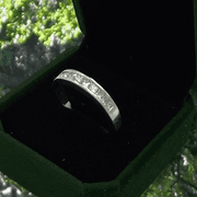 Dazzling White Gold Princess Cut Channel Set Diamond Band