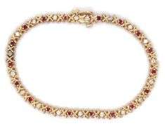 14kt Yellow gold ruby and diamond tennis bracelet