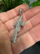 Rhodium Plated 925 Sterling Silver CZ Ribbon Cross Pendant