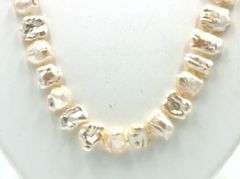 Creamy pearl strand necklace with Jade clasp