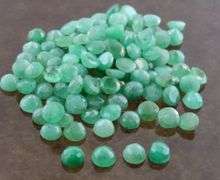 Huge! 31.10ct set of round cut Zambian Emeralds!