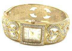 Isacc Mizrahi gold tone and Rhinestone hinged bangle bracelet watch