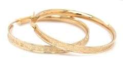 14kt Yellow gold Flat hoop with edge