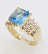 Blue Topaz & Diamond Ring in 14k Yellow Gold