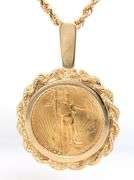 1/10th OZ Eagle coin pendant in 24kt yellow gold on rope chain necklace