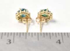 Elegant Emerald and Diamond Stud Earrings in 14K Yellow Gold