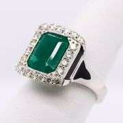 Elegant 18K GIA certified 4.22 ct. Emerald and Diamond Ring