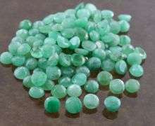 Huge! 31.10ct set of round cut Zambian Emeralds!