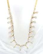 18kt Yellow gold 1.25ctw Illusion set diamond necklace
