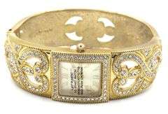 Isacc Mizrahi gold tone and Rhinestone hinged bangle bracelet watch