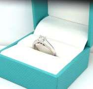 14kt White gold 0.70ct Radiant solitaire engagement ring