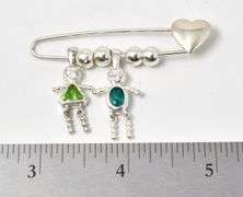 Charm Brooch in Sterling Silver