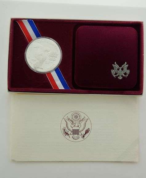 1983-S $1 Los Angeles Olympiad Coliseum PR DCAM IN OGP