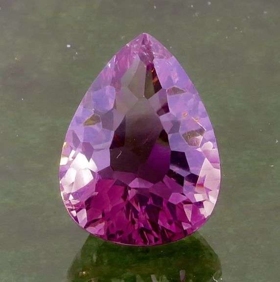 Concave flashing 10.31c rich violet Amethyst