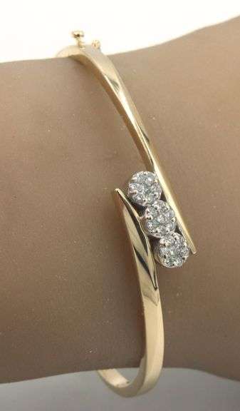 14kt Yellow gold 0.75ctw diamond cluster bypass bangle