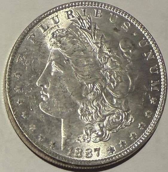 1887 BU Raw Frosty White Morgan Dollar