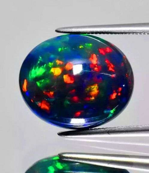 Full cover! Full spectrum! Huge 6.51ct Black Opal