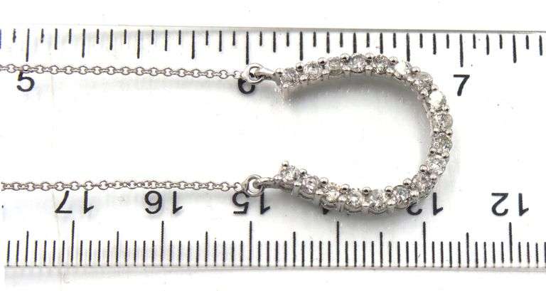 14kt White gold 0.75ctw diamond horse shoe pendant on chain
