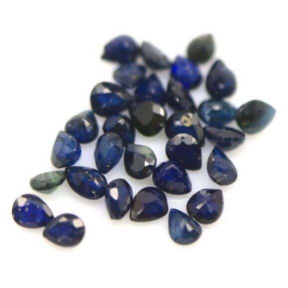 Heated only! 8.66ct ink blue Sapphire set from Madagascar