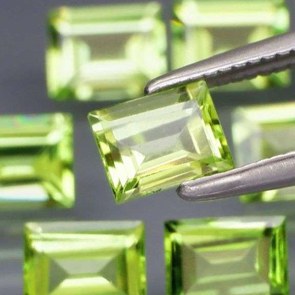 Brilliant 4.70ct 10pc set of matched baguette cut Peridot