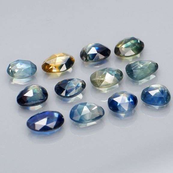Super unique 3.79ct blue green Sapphire set