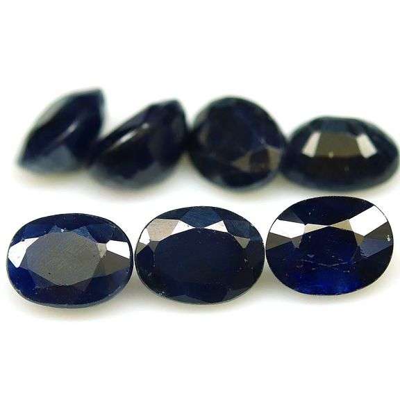 Heavy 14.02ct midnight blue Sapphire set