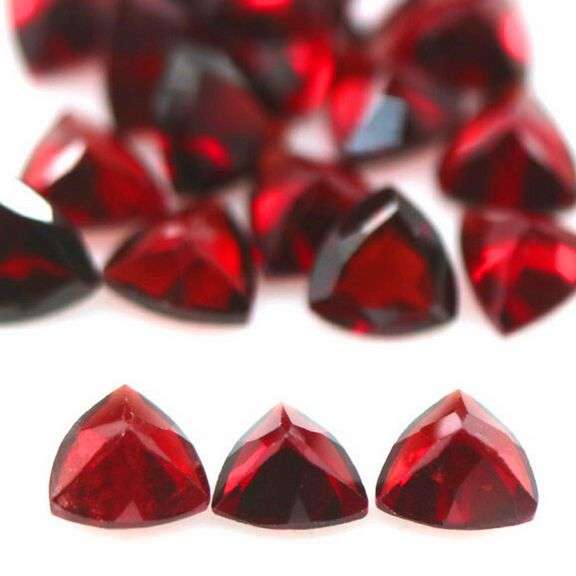 Stunning 10.94ct trillion cut cherry red Garnet set