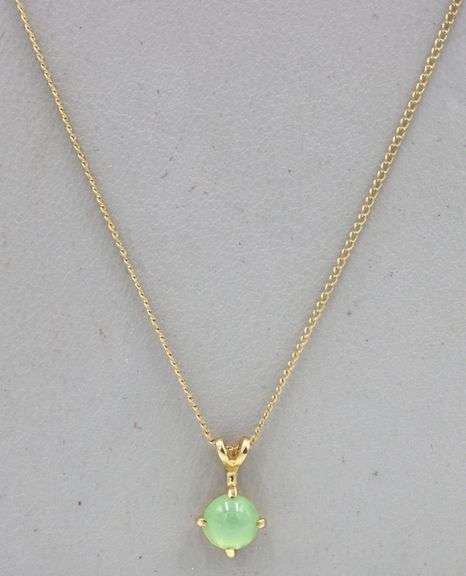 14kt Yellow gold round green star sapphire pendant on chain