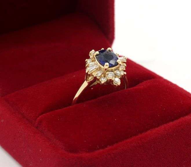 14kt Yellow gold Apx 1.10ct Oval Sapphire & Apx 0.55ctw Diamond Ring