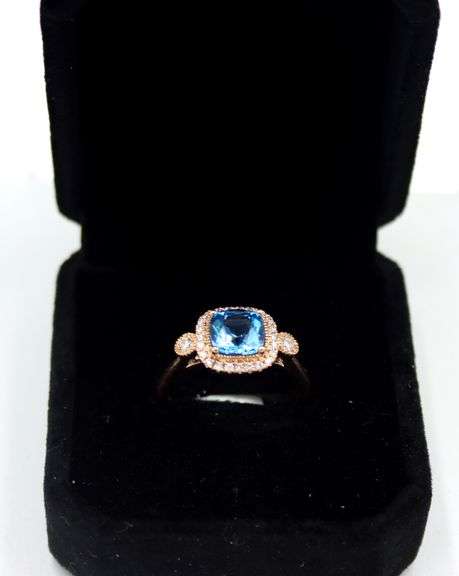 14kt Rose gold blue topaz & diamond Halo Ring