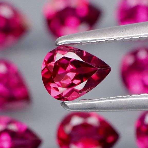 Premium color! 4.57ct matched pink violet Garnets!