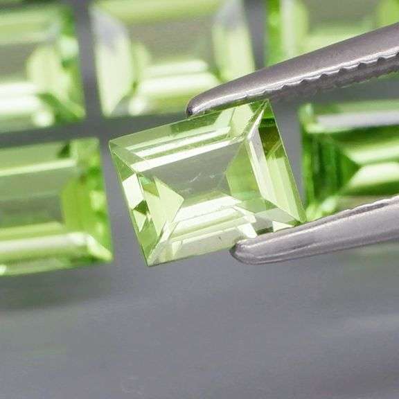 Brilliant 5.50ct 12pc set of matched baguette cut Peridot