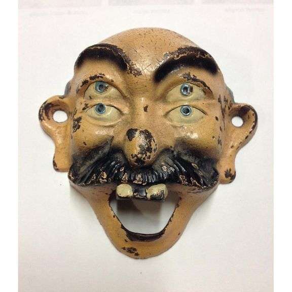 Cast Iron 4-Eyed Circus Bottle Opener