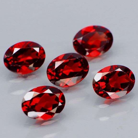 Premium 7.32ct oval cut cherry red Garnet set