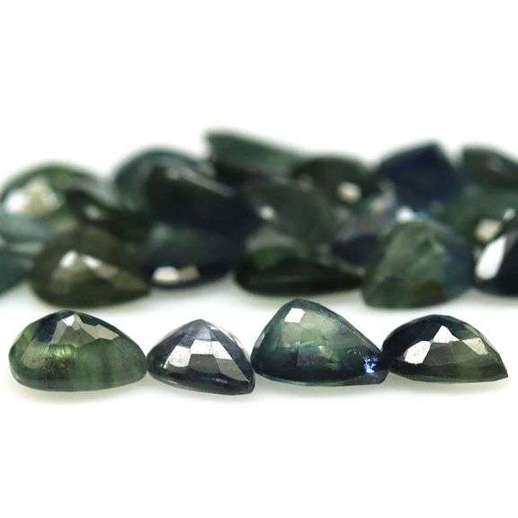 Stunning blue green 8.53ct pear cut Sapphire set