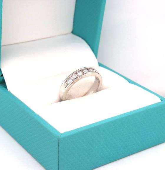 14kt White gold diamond channel set band