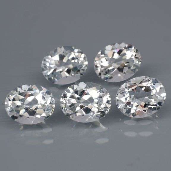 5 high fire diamond white Topaz weighing 3 carats each!