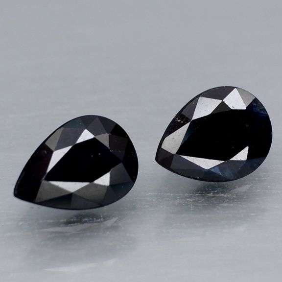 Elegant 1.67ct matched pair of midnight blue Sapphires
