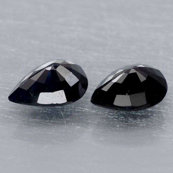 Elegant 1.67ct matched pair of midnight blue Sapphires