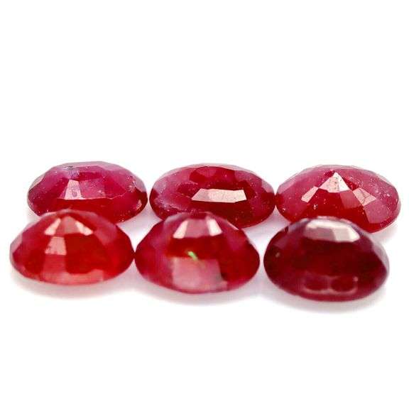Heavy 10.90ct oval cut Ruby set