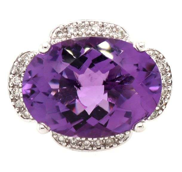 14kt White gold oval amethyst and diamond frame ring