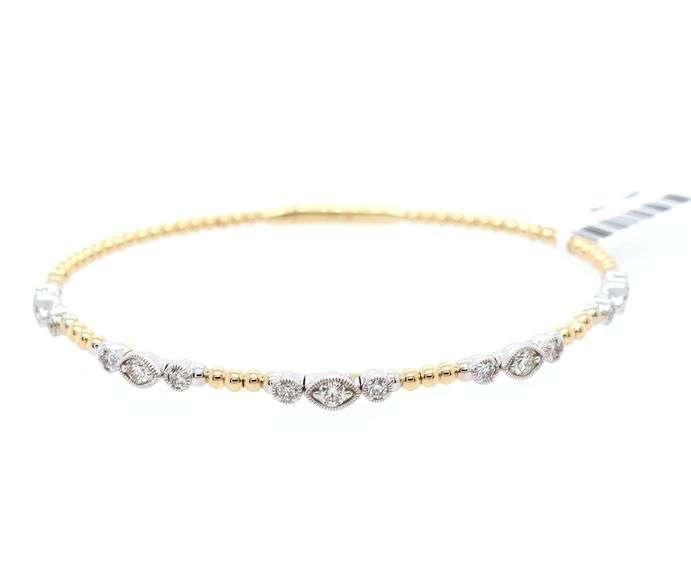 New 14kt yellow and white 0.70ctw Diamond Station Two Tone Flexible Bangle Bracelet