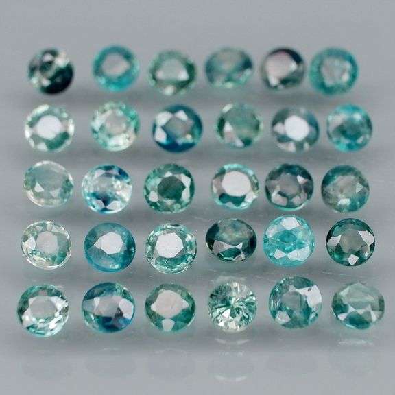 Heated only! 4.38ct blue green Sapphire set